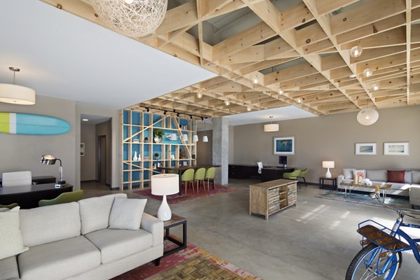 Clubhouse featuring modern design and cozy seating at Pierside Apartments