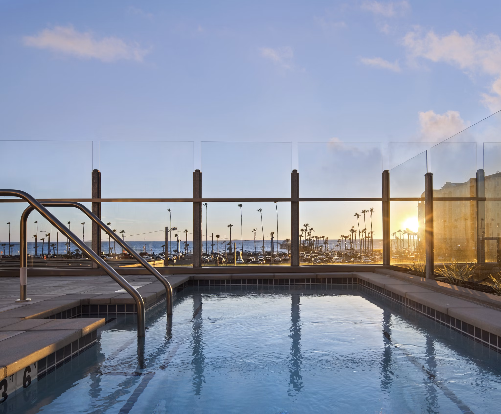 Inviting outdoor pool at Pierside Apartments offering luxury living near the waterfront