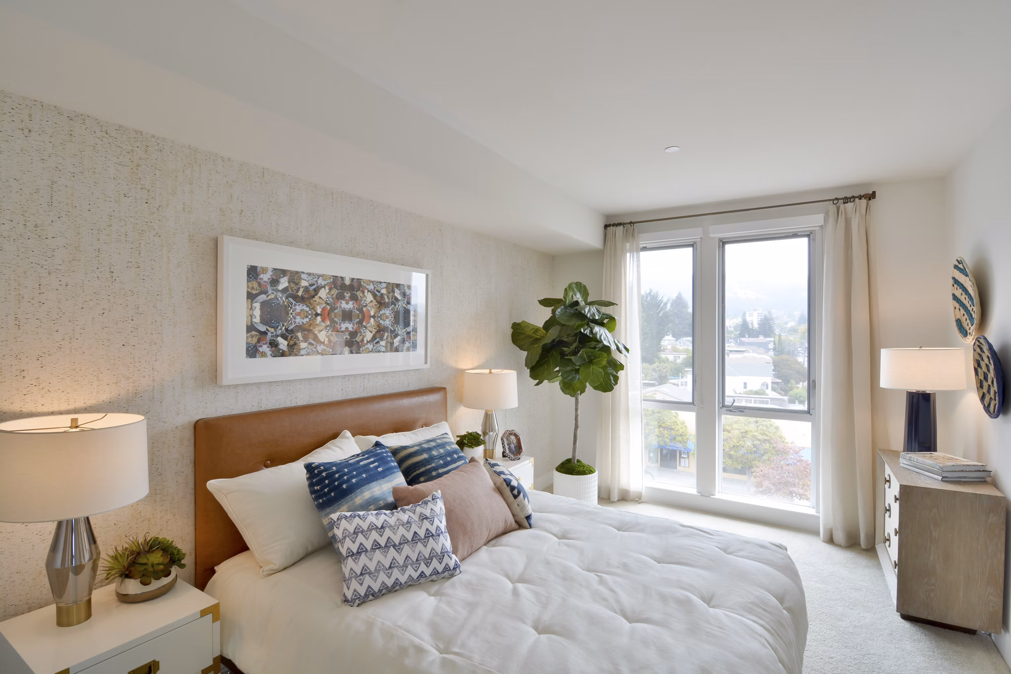 Cozy bedroom with modern furnishings at Parker luxury apartments