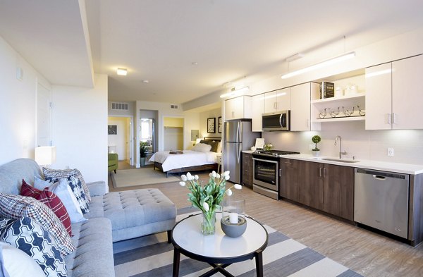 Spacious living room with modern decor and ample natural light in Parker luxury apartments