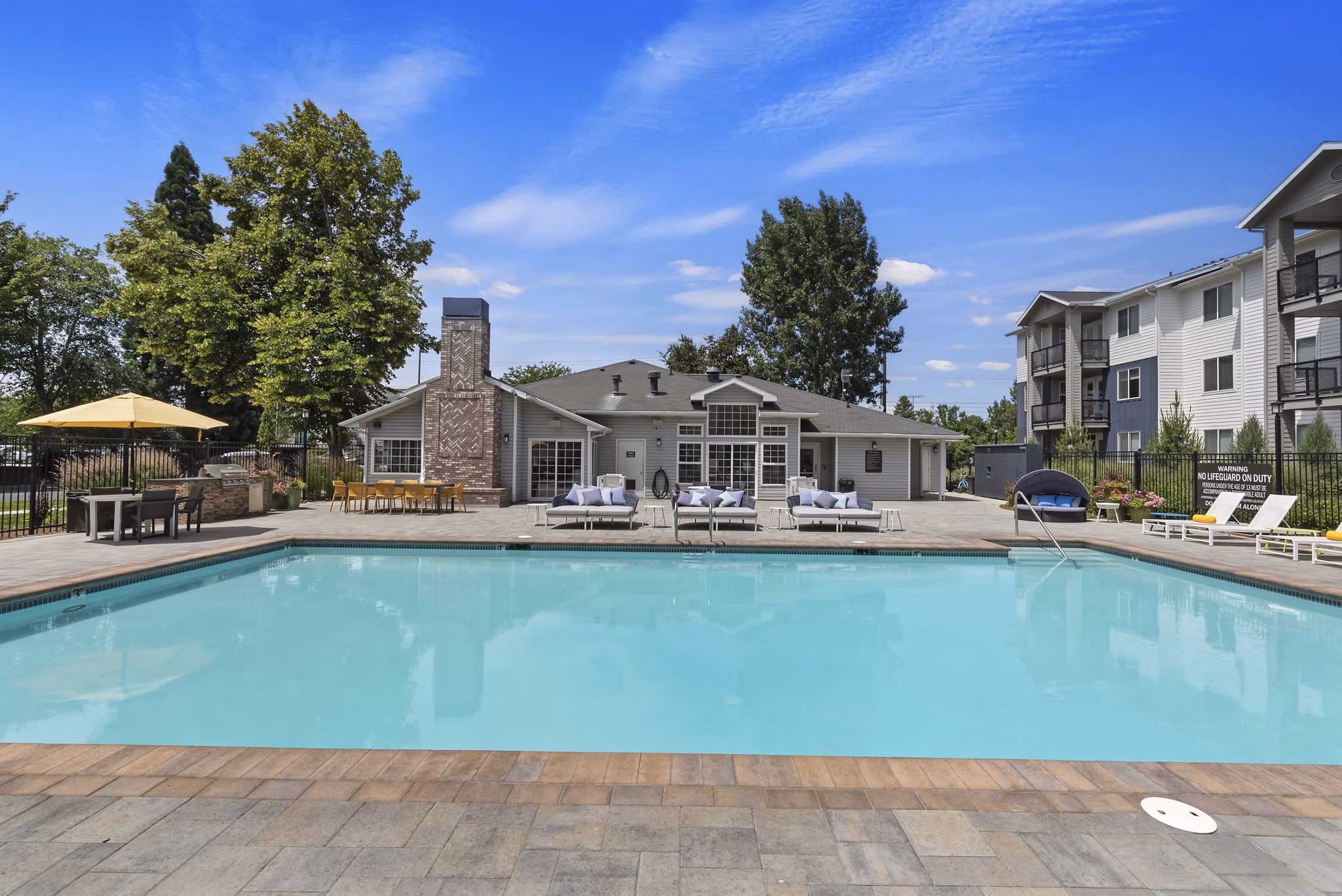 Luxury pool at Rosewood Apartments offering relaxation and scenic views in a premium setting