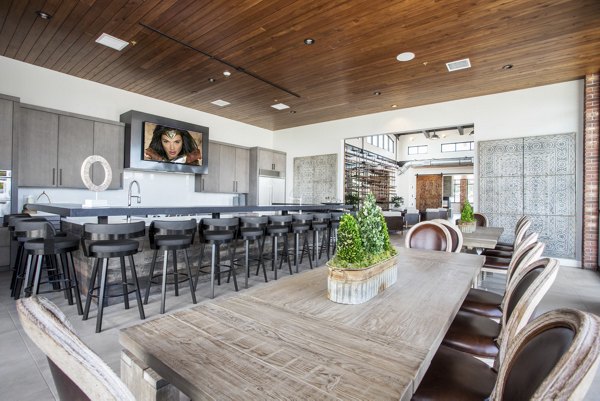 Clubhouse featuring cozy lounge areas and modern design at 4th West Apartments, a luxury living destination