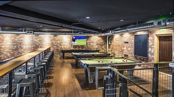 Clubhouse with modern design and seating at 4th West Apartments in downtown area, offering luxury amenities for residents