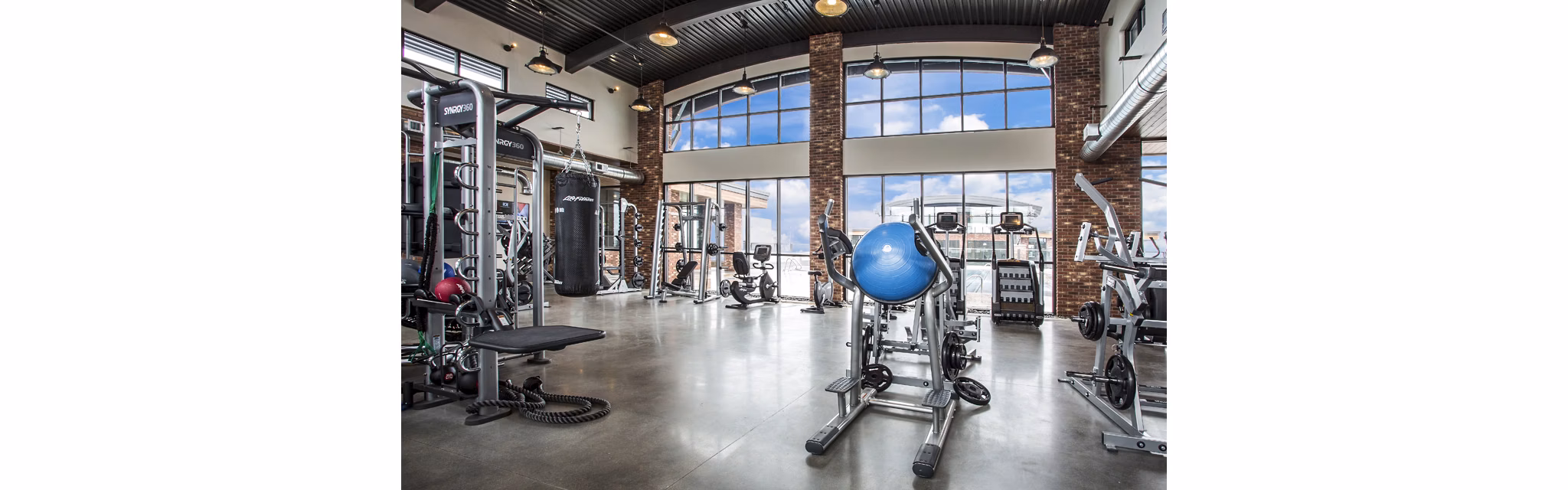 Modern fitness center with state-of-the-art equipment at 4th West Apartments
