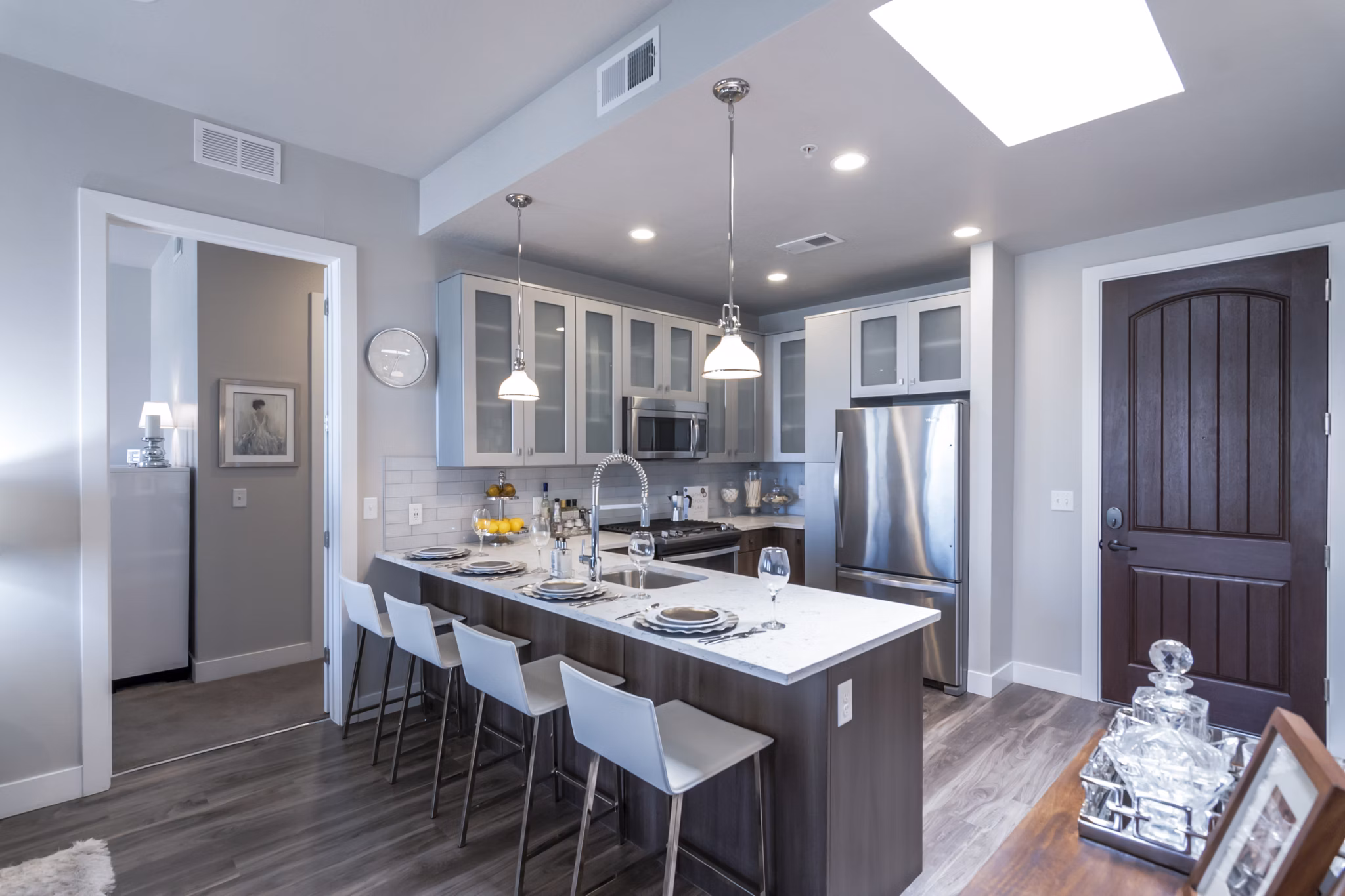Modern kitchen with stainless steel appliances at 4th West Apartments, a Greystar luxury apartment community