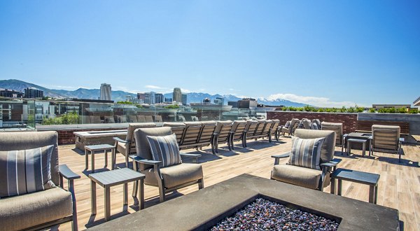 Cozy fire pit on modern patio at 4th West Apartments