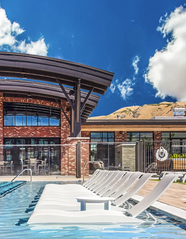 Infinity-edge pool at 4th West Apartments with skyline views
