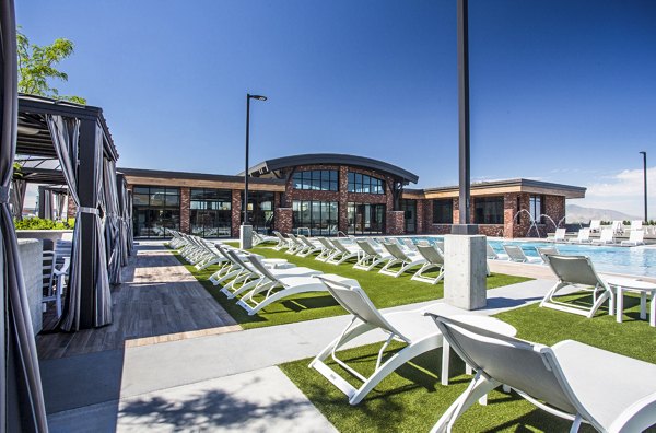 Rooftop pool with cityscape views at 4th West Apartments