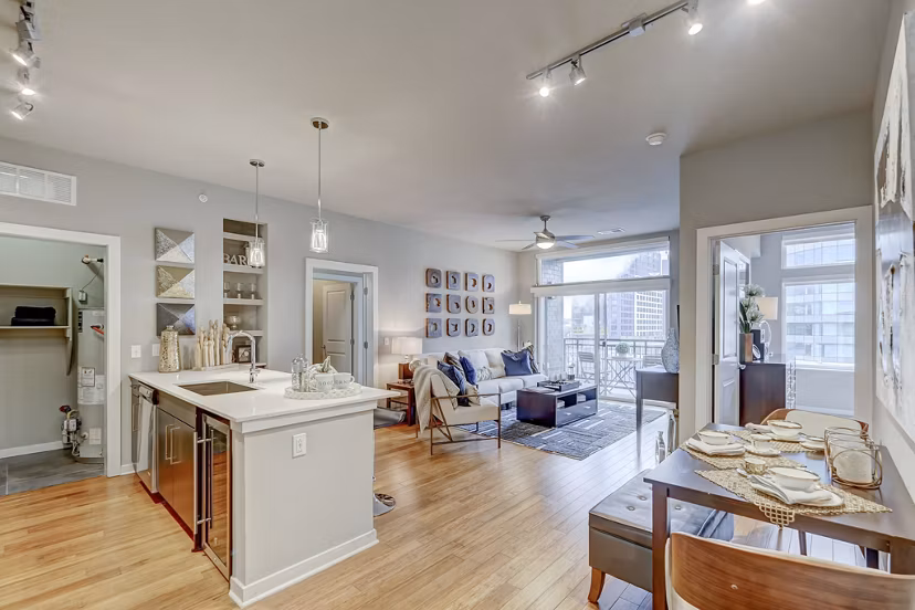 Modern kitchen with stainless steel appliances at Alara Union Station Apartments, offering luxury living in a prime city location