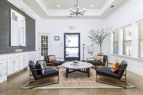 Clubhouse lobby featuring modern seating and decor at The Dorel/Girard Court Apartments