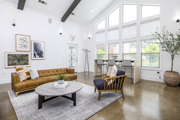 Clubhouse lobby featuring modern decor and seating at The Dorel/Girard Court Apartments