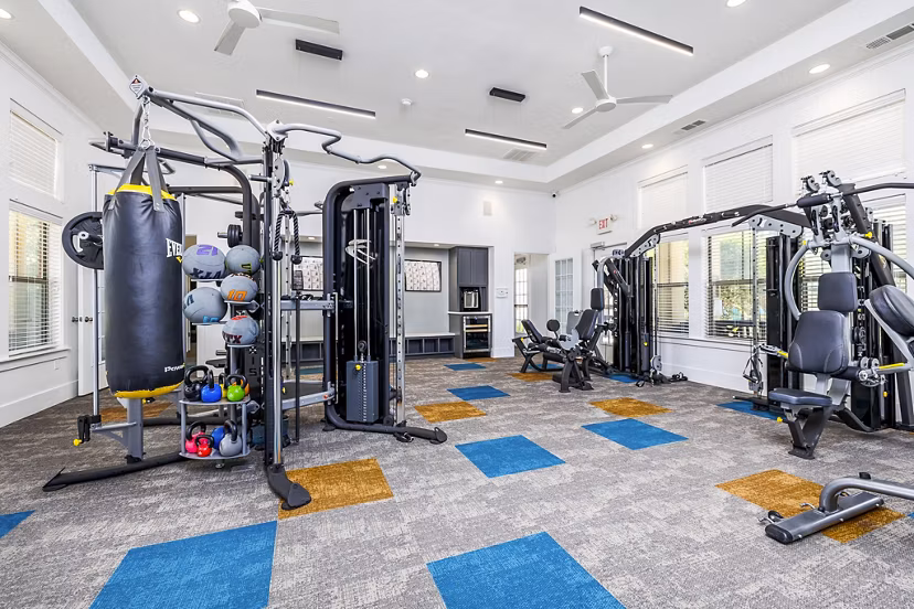 Modern fitness center at The Dorel/Girard Court Apartments featuring state-of-the-art equipment for luxury living experiences