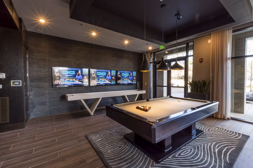 Clubhouse featuring modern design elements at Anderson Flats Apartments, a Greystar luxury apartment community