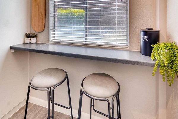 Dining room featuring elegant decor and modern furniture at The Glen at Old Town Apartments