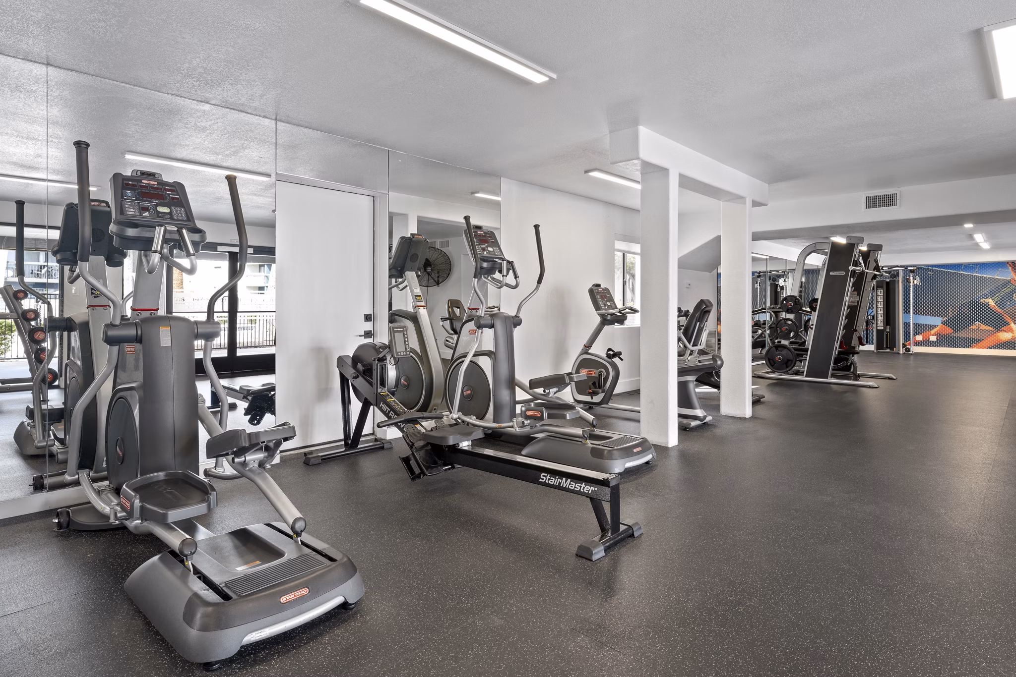 Fitness center with modern equipment at The Glen at Old Town Apartments