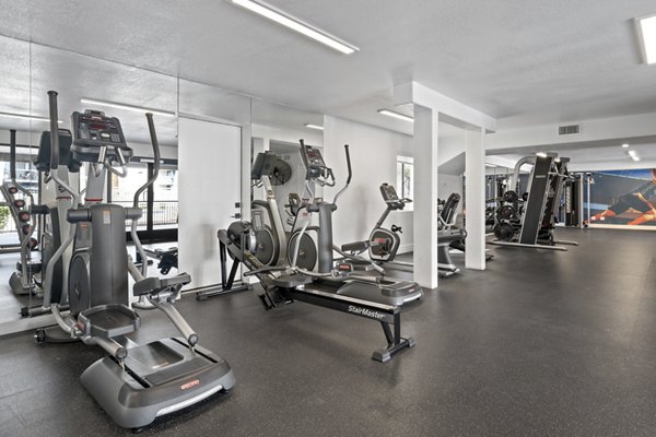 Fitness center with modern equipment at The Glen at Old Town Apartments