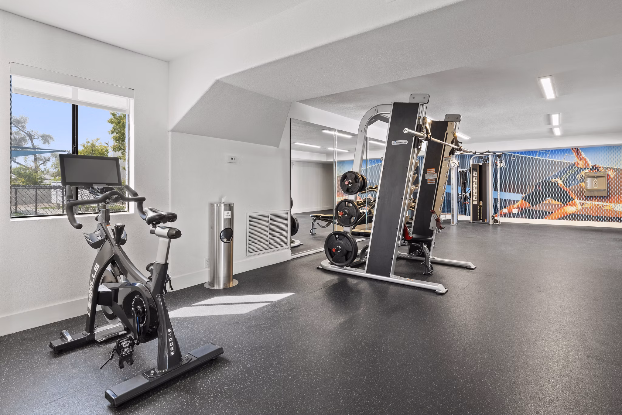 Modern fitness center with the latest equipment at The Glen at Old Town Apartments for active lifestyles and wellness enthusiasts