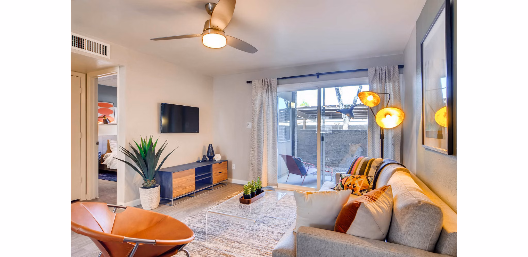Spacious living room with modern decor at The Glen at Old Town Apartments