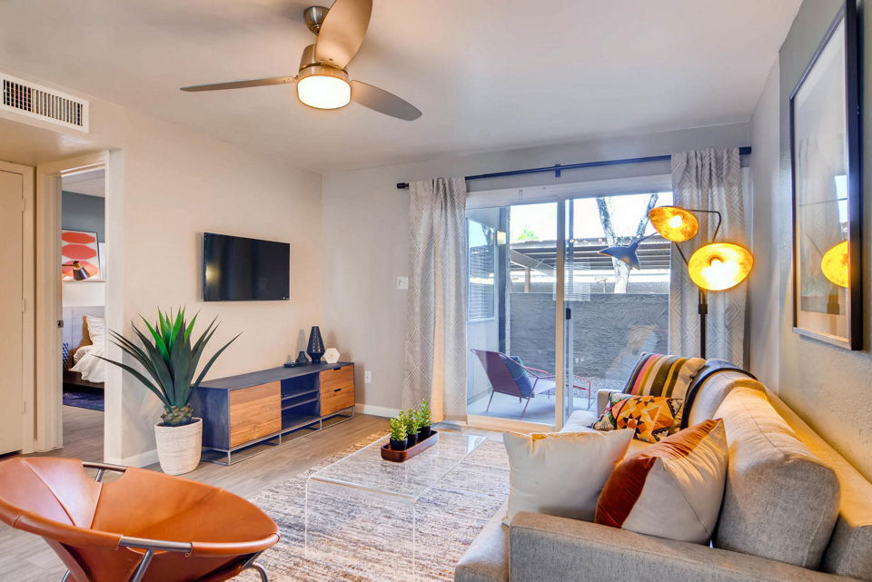 Spacious living room with modern decor at The Glen at Old Town Apartments