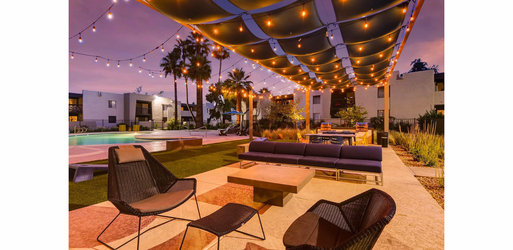 The Glen at Old Town Apartments: Lush courtyard with gardens and seating areas, offering a serene retreat in a luxury apartment community