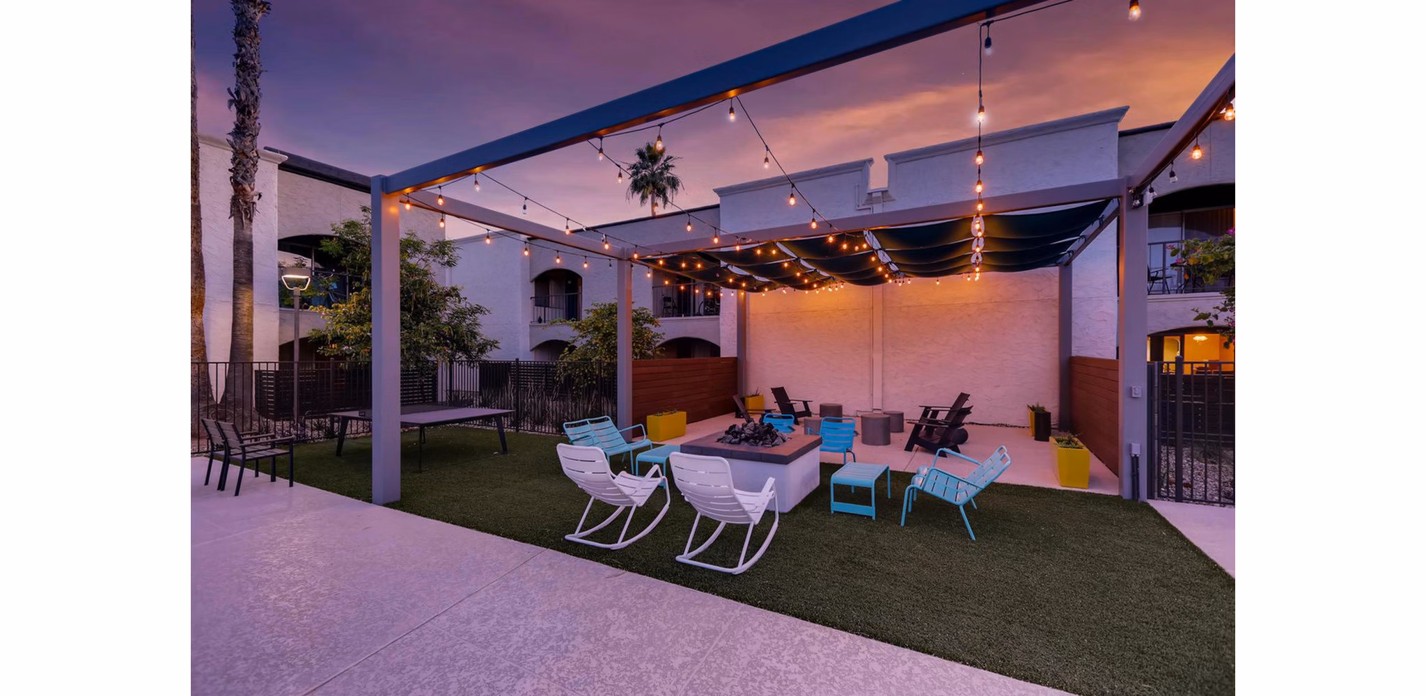 Charming courtyard with lush greenery at The Glen at Old Town Apartments, a  luxury community