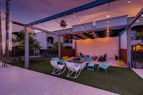 Charming courtyard with lush greenery at The Glen at Old Town Apartments, a  luxury community