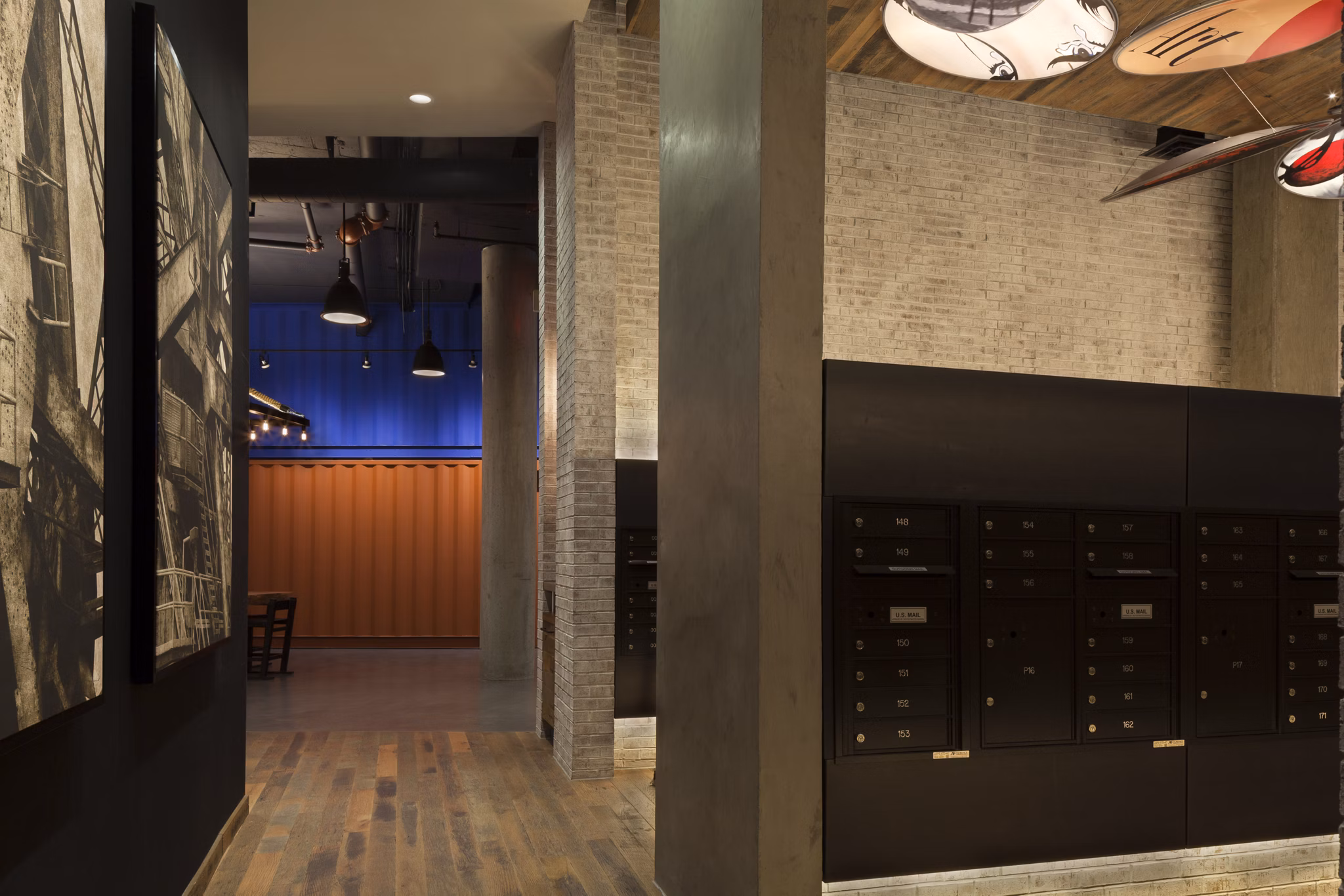 Mail room with organized parcel lockers at Anthology Apartments