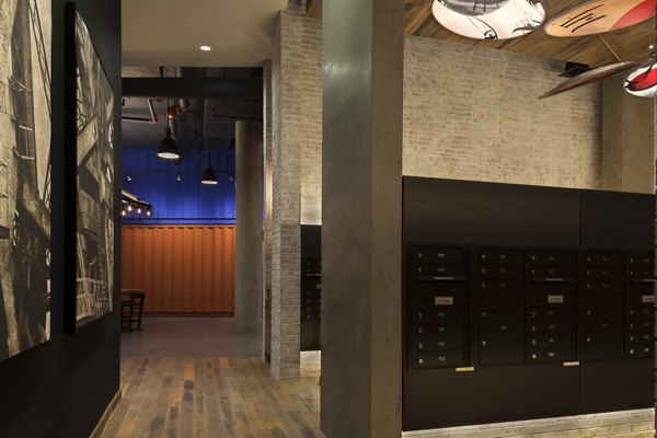 Mail room with organized parcel lockers at Anthology Apartments