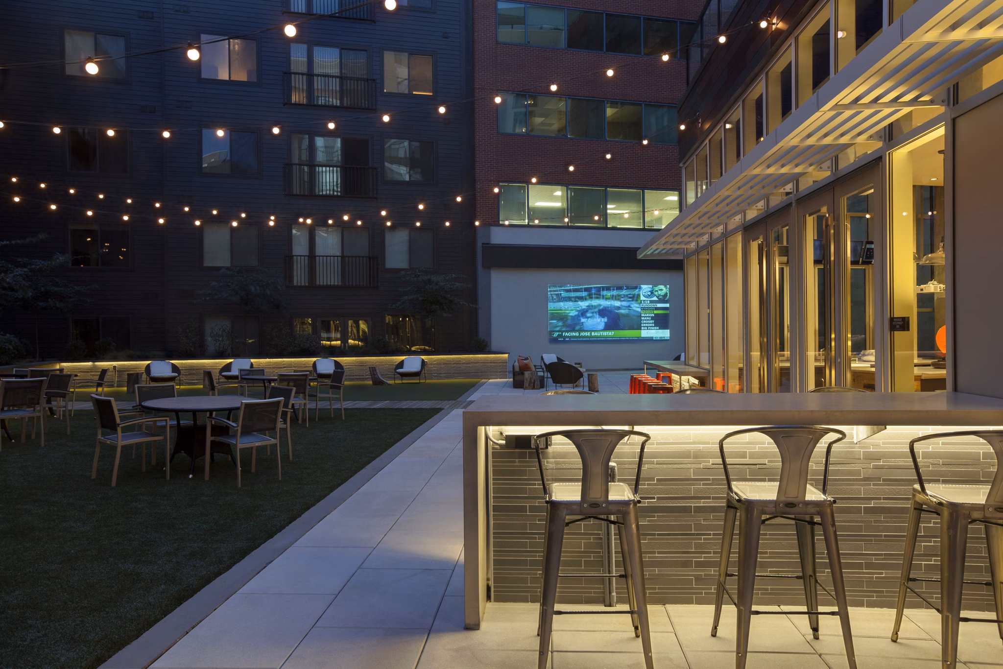 Cozy patio area featuring modern seating at Anthology Apartments