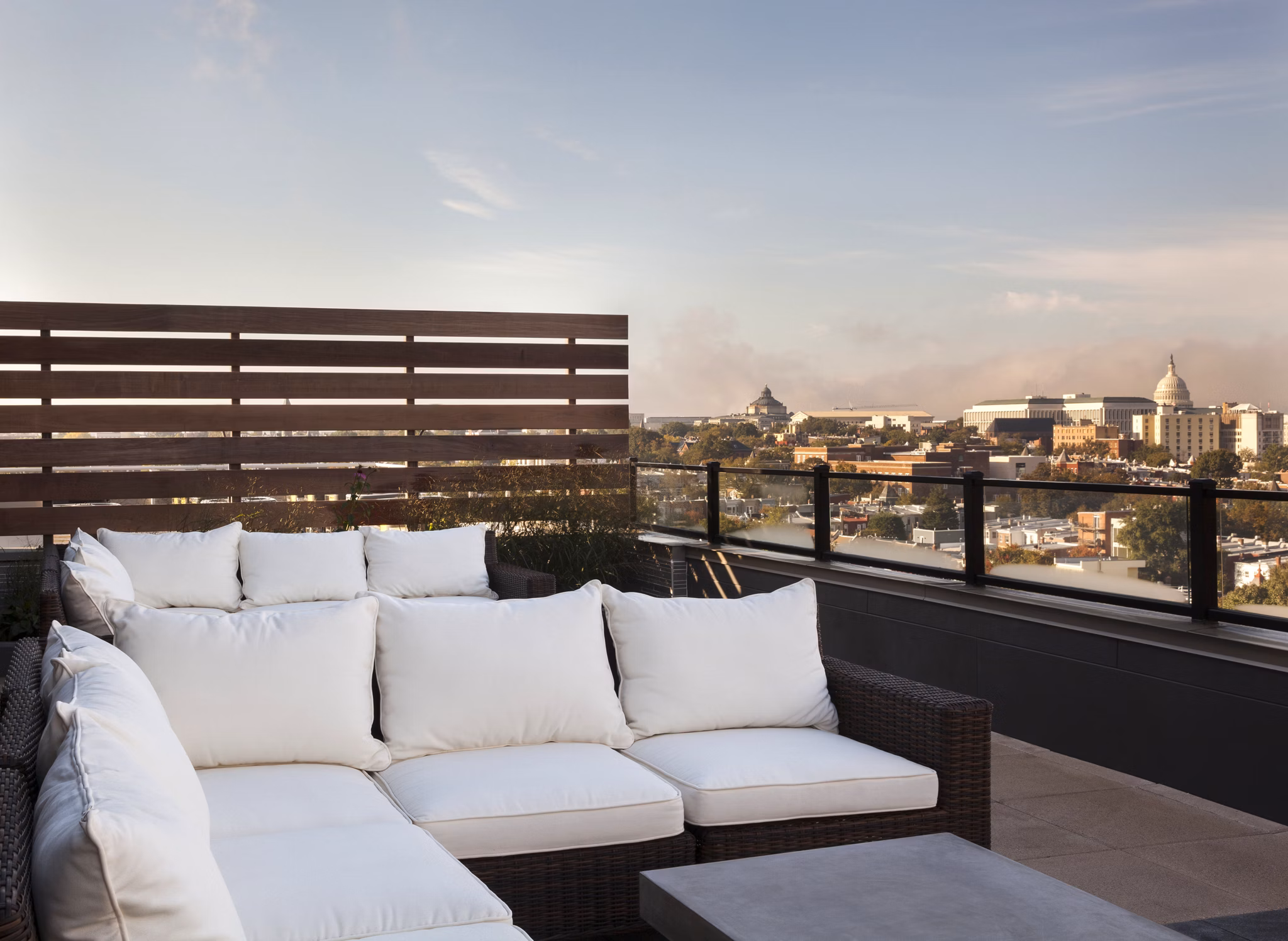 Patio area with modern outdoor seating at Anthology Apartments, luxury Greystar property