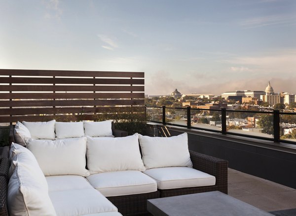 Patio area with modern outdoor seating at Anthology Apartments, luxury Greystar property