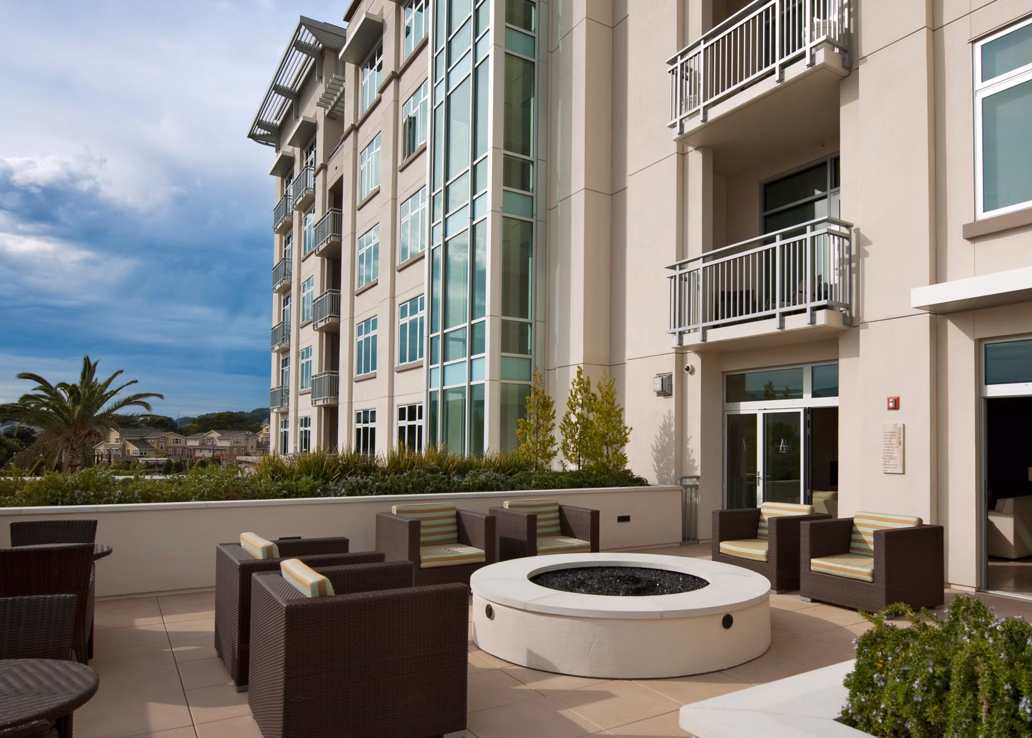 Outdoor fire pit area at Ashton San Francisco Apartments with modern seating and ambient lighting for luxury living experiences