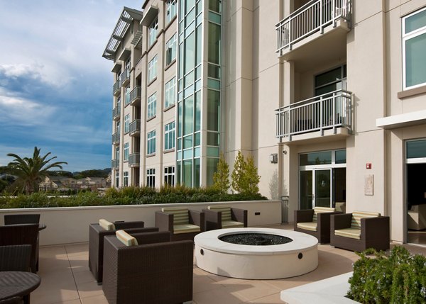 Outdoor fire pit area at Ashton San Francisco Apartments with modern seating and ambient lighting for luxury living experiences