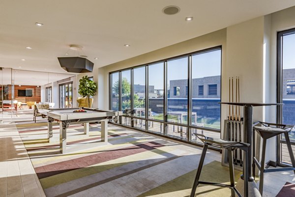 clubhouse game room at ORE 82 Apartments