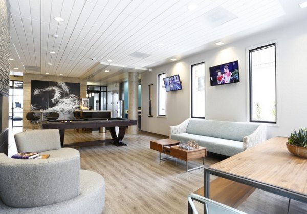 Modern clubhouse with stylish seating and views at Waterbend Apartments