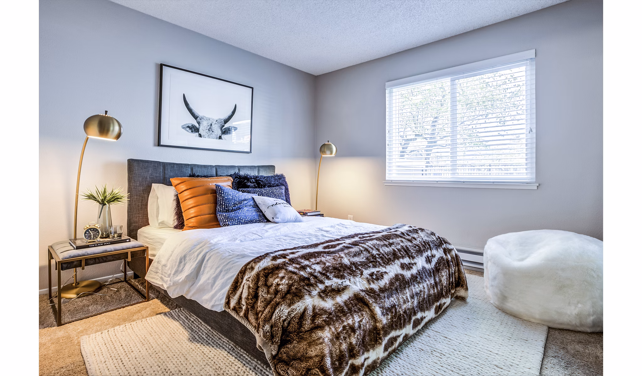 Cozy bedroom with modern furnishings at Avana Almaden Apartments, a luxury Greystar property in San Jose