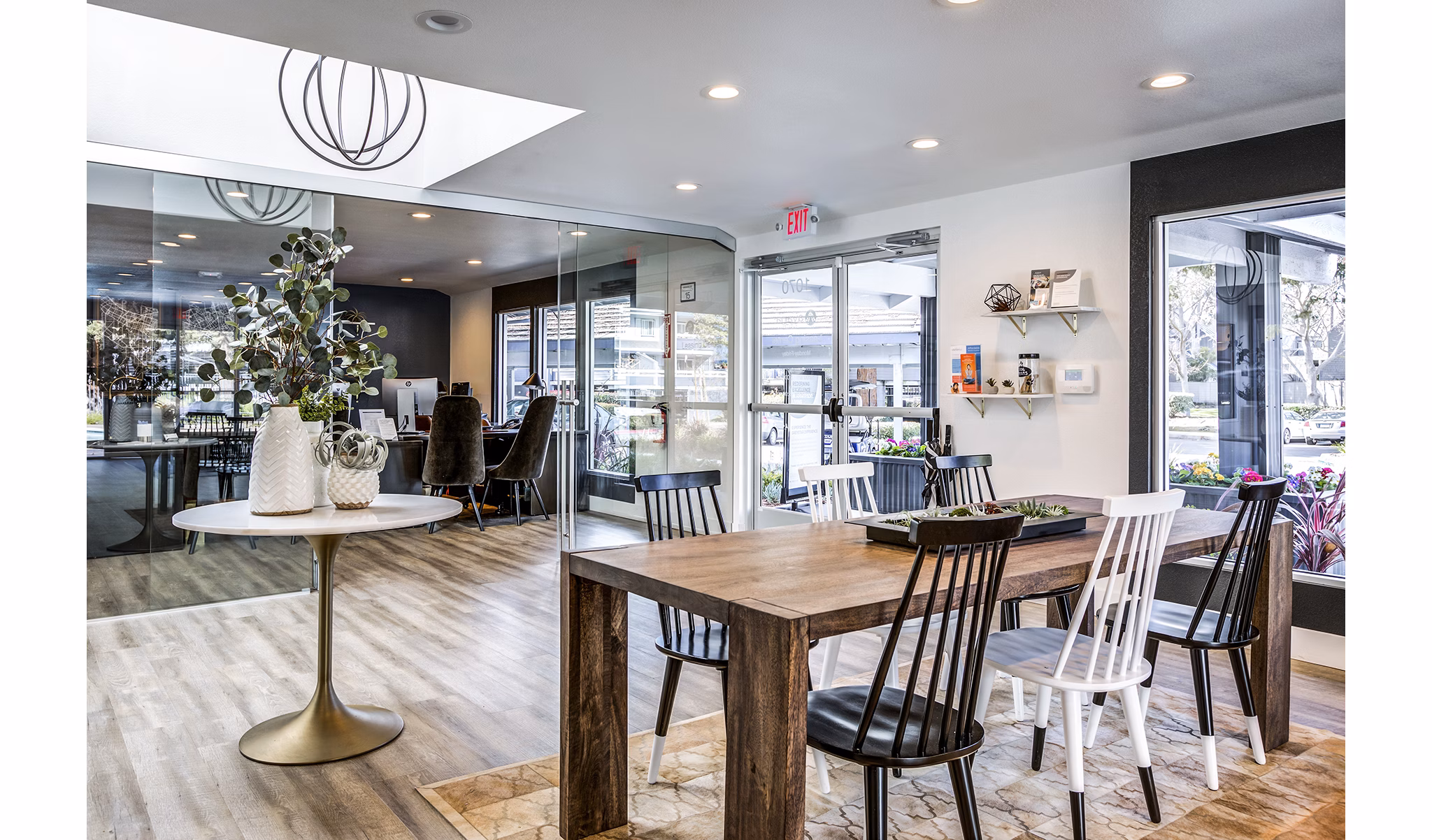 Clubhouse lobby with modern decor and seating at Avana Almaden Apartments
