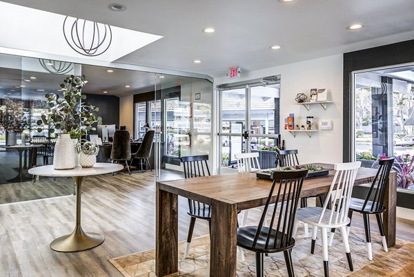 Clubhouse lobby with modern decor and seating at Avana Almaden Apartments