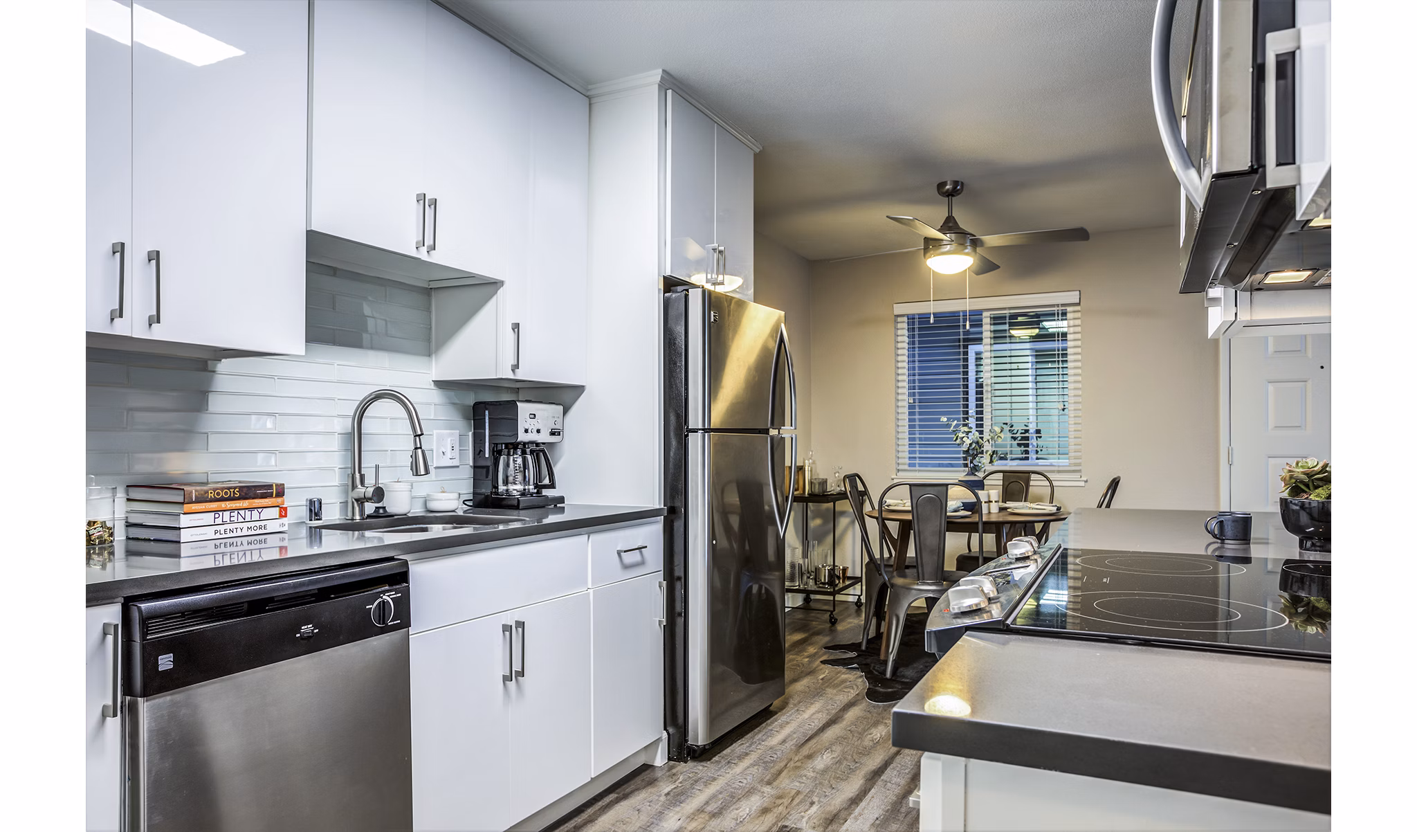 Modern kitchen with stainless steel appliances at Avana Almaden Apartments