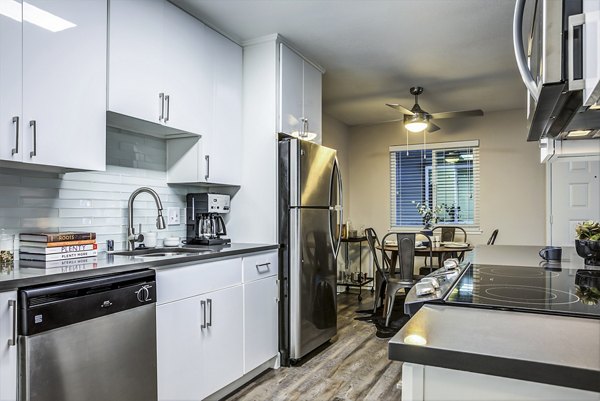Modern kitchen with stainless steel appliances at Avana Almaden Apartments
