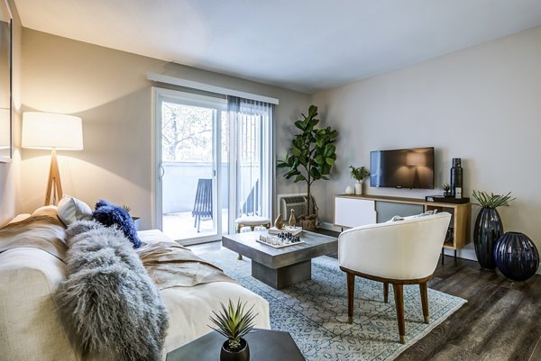 Spacious living room with modern furnishings at Avana Almaden Apartments