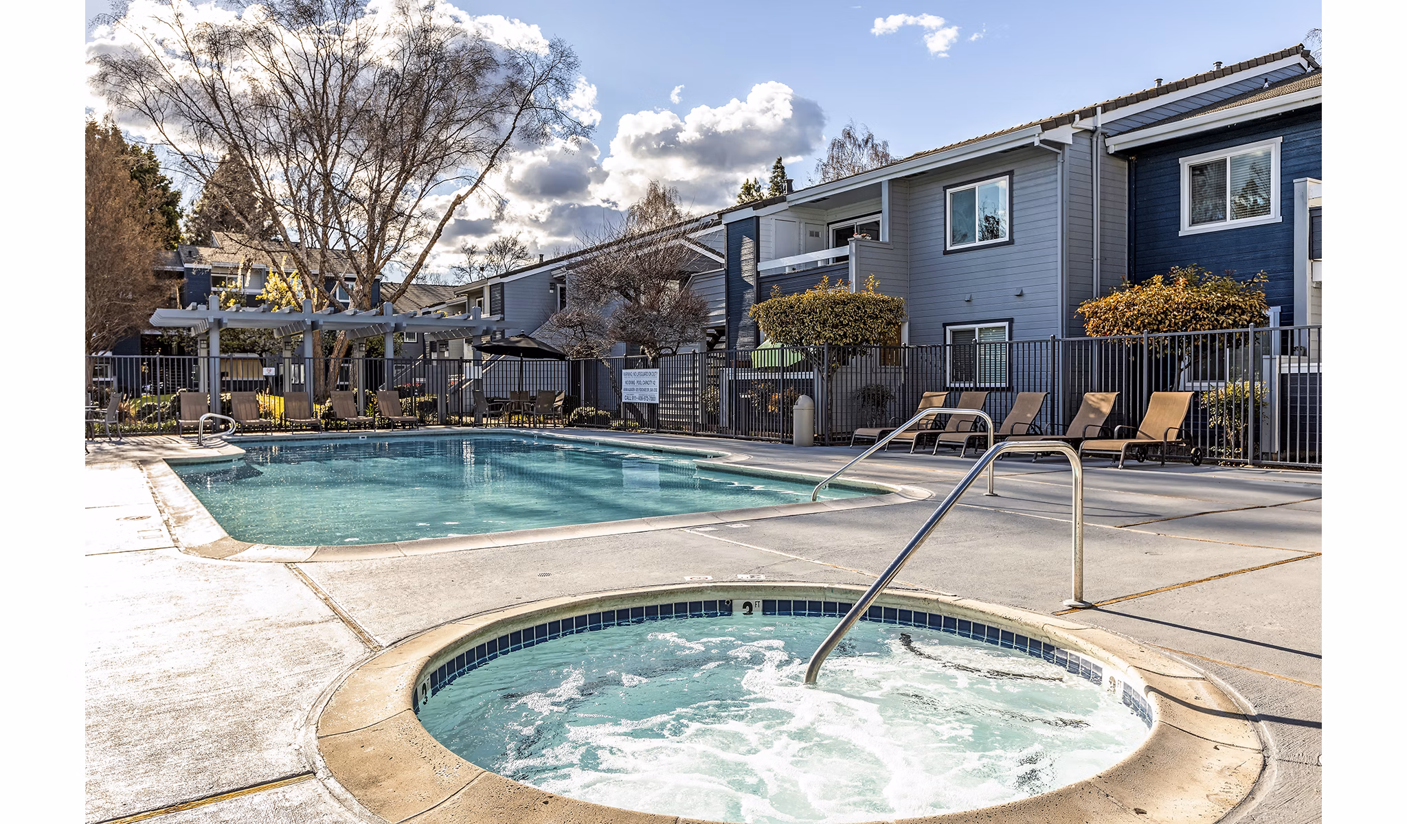 Relaxing hot tub area at Avana Almaden Apartments with ambient lighting and modern design, ideal for unwinding after a long day
