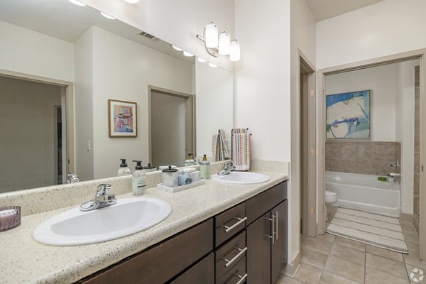 Spacious bathroom with modern fixtures at Pencil Factory Flats Apartments