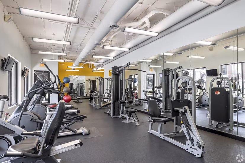 fitness center at Pencil Factory Flats Apartments