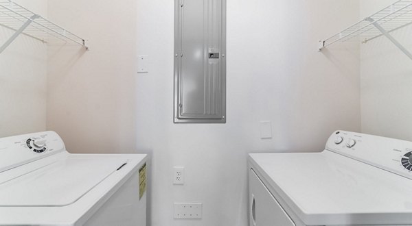 laundry room at Pencil Factory Flats Apartments