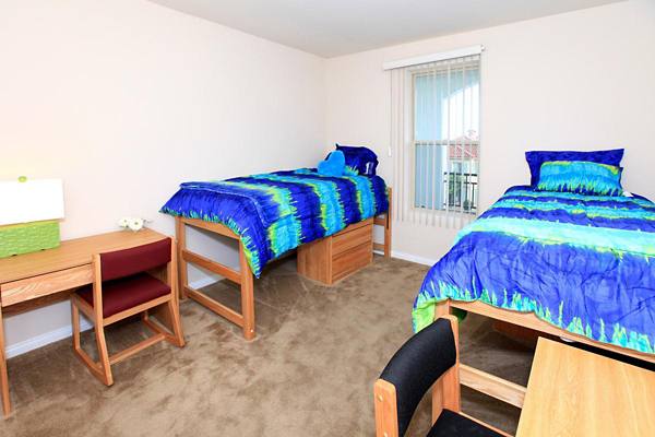bedroom at Tuscany Apartments