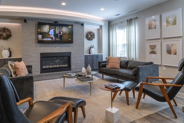Lux at Stoughton Apartments: Elegant clubhouse with modern amenities in a vibrant community setting