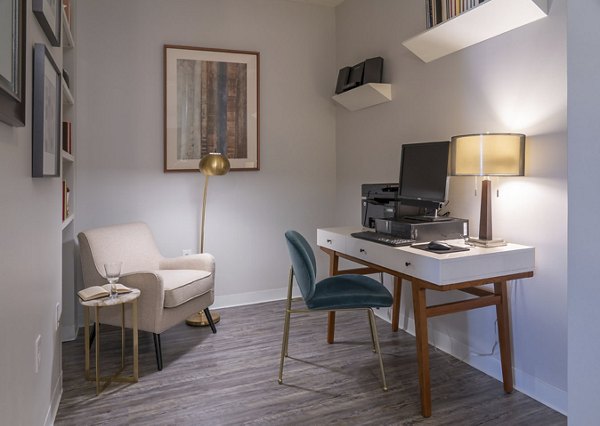 Spacious kitchen with modern stainless steel appliances in Lux at Stoughton Apartments