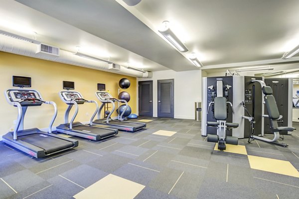 fitness center at The Russell Apartments