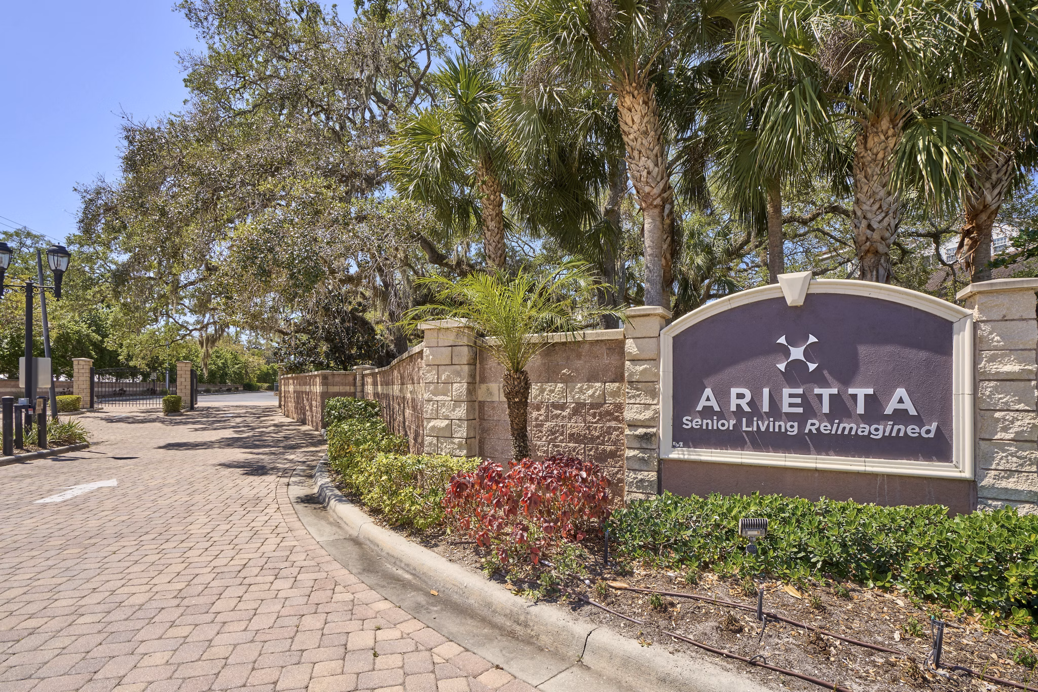 Arietta Apartments: Modern signage at luxury property in downtown location